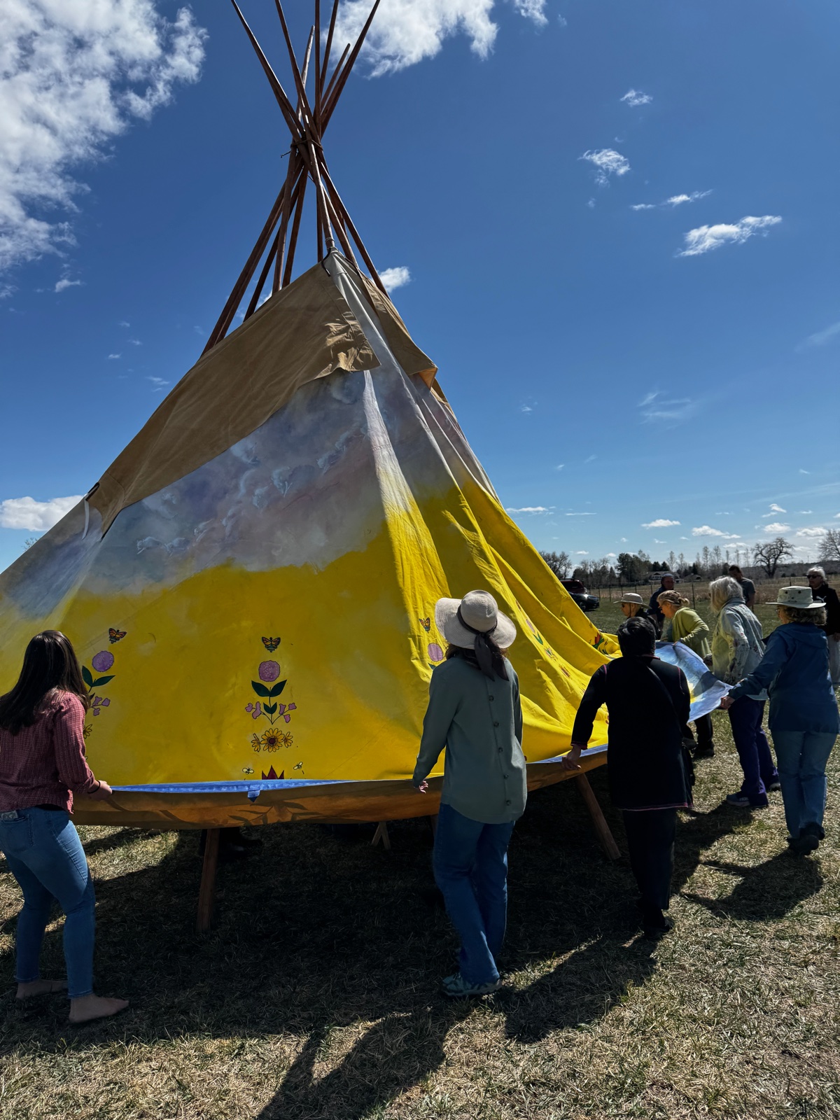 Raising the Lakota tipi in Niwot